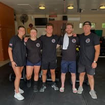 CFA training group together in team shirts